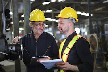 Worker,Or,Engineer,Working,In,Factory,With,Safety,Uniform,,